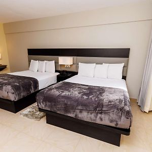 Suite met een Queen Size Bed